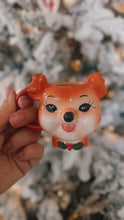 Load image into Gallery viewer, Our sweet little vintage inspired ceramic reindeer mugs are perfect for teeny tiny hands . Or to style into your tiered trays and decor. Dasher is the first release in our ‘Santa's Retro Reindeer Collection’ Why not collect the whole set! Measures approximately 8cm 100mls * Each of our little mugs are hand painted, there may be slight variances in colour and paint details. We recommend hand wash for longevity