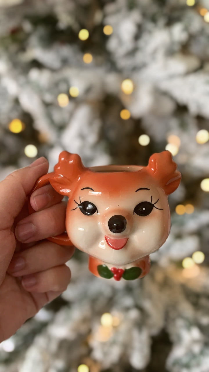 Our sweet little vintage inspired ceramic reindeer mugs are perfect for teeny tiny hands . Or to style into your tiered trays and decor.    Dasher is the first release in our ‘Santa's Retro Reindeer Collection’  Why not collect the whole set!    Measures approximately 8cm   100mls     * Each of our little mugs are hand painted, there may be slight variances in colour and paint details.   We recommend hand wash for longevity