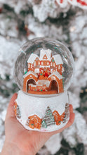 Load image into Gallery viewer, Wind up glitter dome  Plays &quot;We Wish You A Merry Christmas&quot;  Revolving Gingerbread Train.
