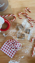 Load image into Gallery viewer, What's more fun than making gingerbread houses? Making mini ones to sit on your festive mugs!!   They come in a sweet little gingham storage bag. Set of 3 pieces.
